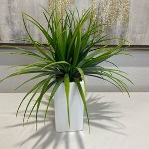 Green Artificial Plant in White Planter